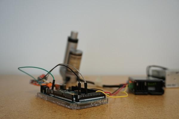 Photo of a brushless DC motor controller when paired with an Arduino and a linear actuator