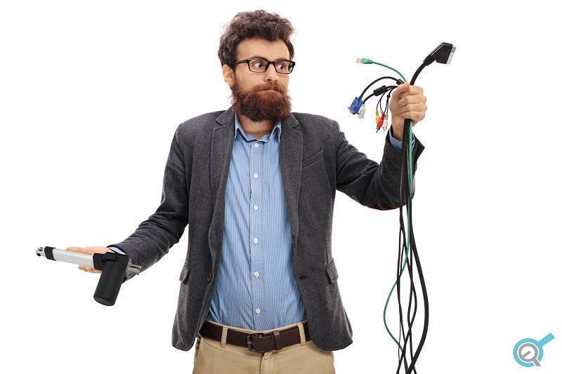 Photo of man holding in hands linear actuator and wiring 
